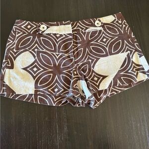 Trina Turk shorts. Size 2. Small stain over button.